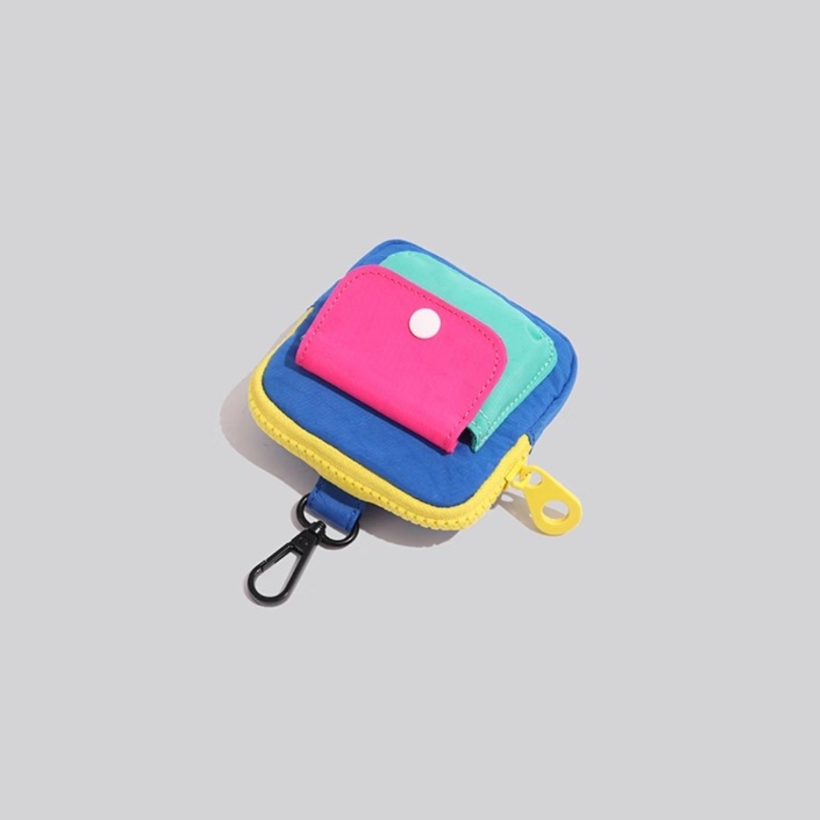Block Mini Coin Purse Swivel L - огляд і ціна Mini Backpack Purse